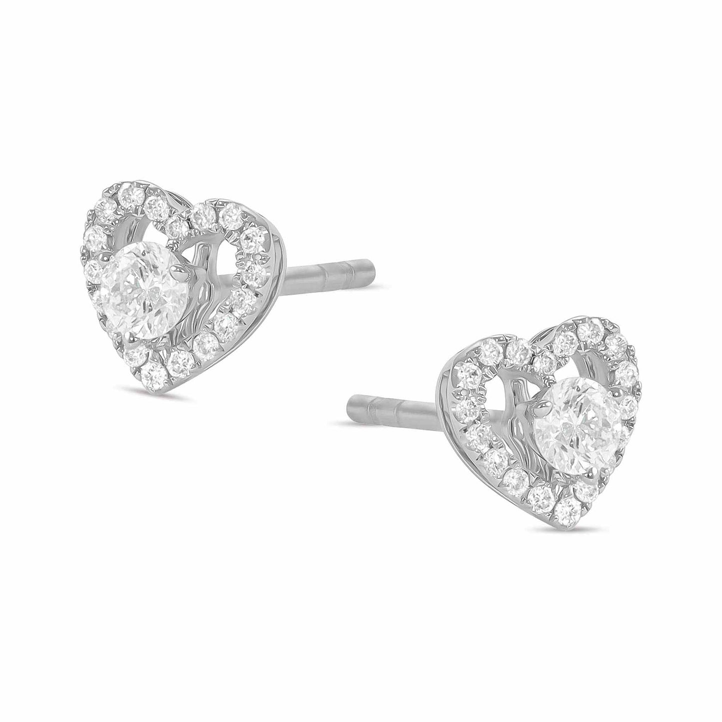 18ct White Gold And Diamond Cluster Earrings 0.29cts - angled view. Elegant nan adorned with gems of remarkable colour and brilliance. Discover affordable luxury today.