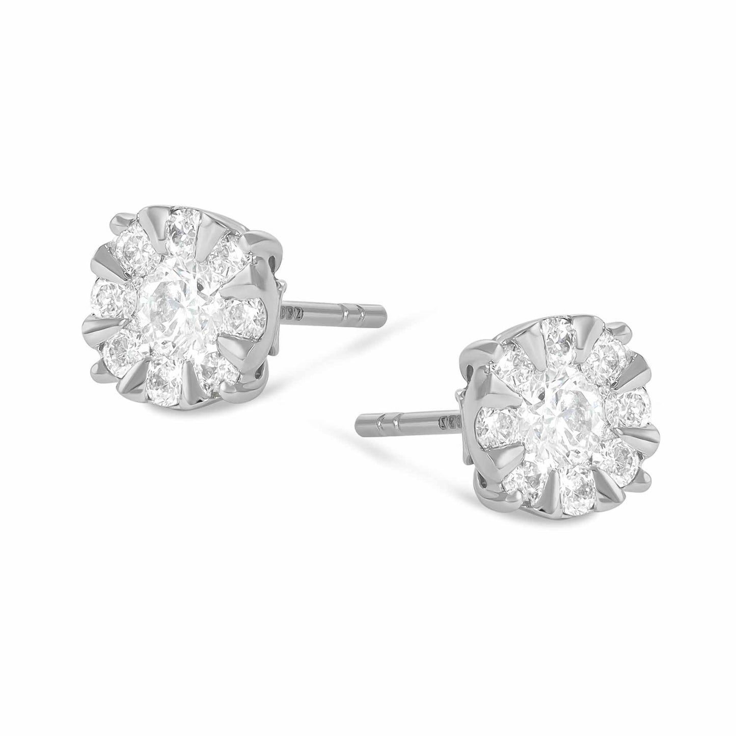18ct White Gold And Diamond Cluster Earrings 0.96cts - angled view. Elegant nan adorned with gems of remarkable colour and brilliance. Discover affordable luxury today.