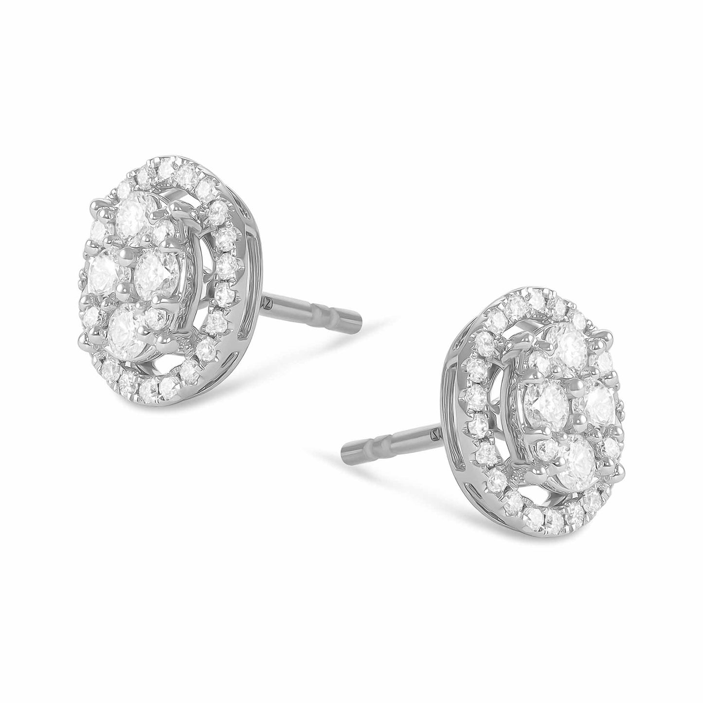 18ct White Gold And Diamond Cluster Earrings 0.63cts - angled view. Elegant nan adorned with gems of remarkable colour and brilliance. Discover affordable luxury today.