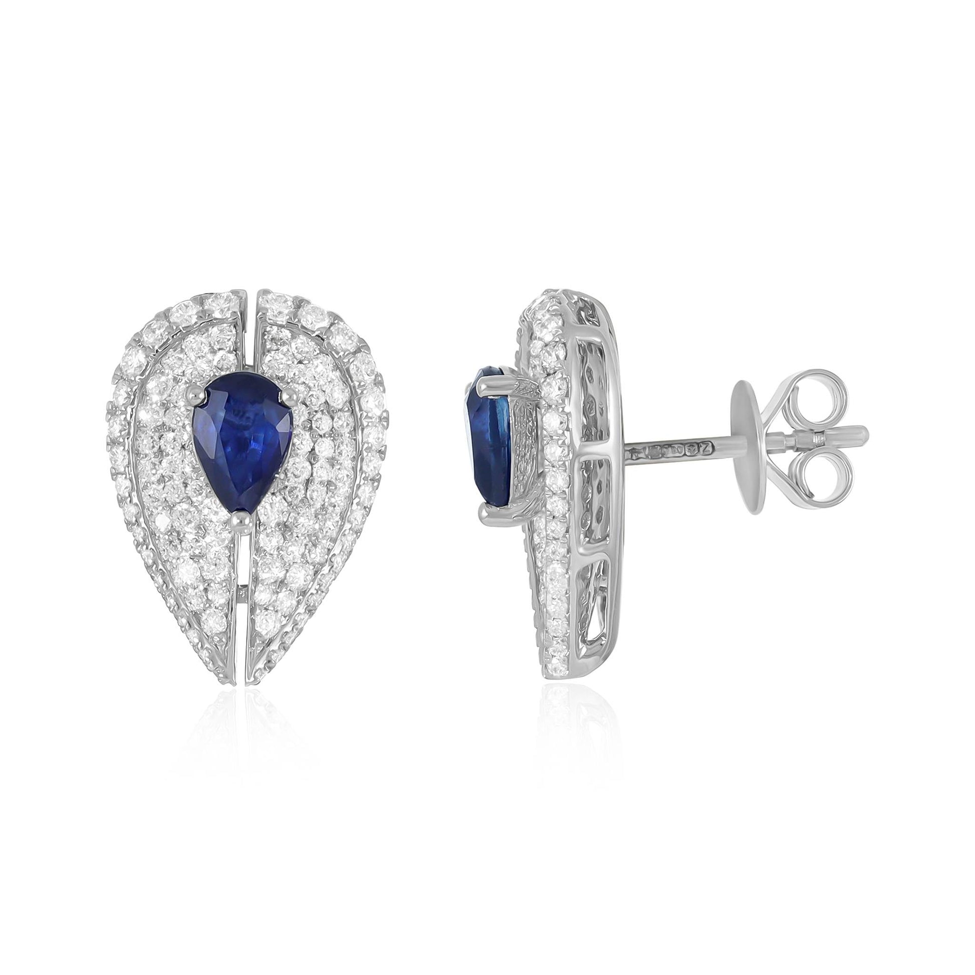 18ct White Gold Diamond And Saphire Halo Earrings - front view. Elegant Apparel & Accessories > Jewelry > Earrings adorned with gems of remarkable colour and brilliance. Discover affordable luxury today.