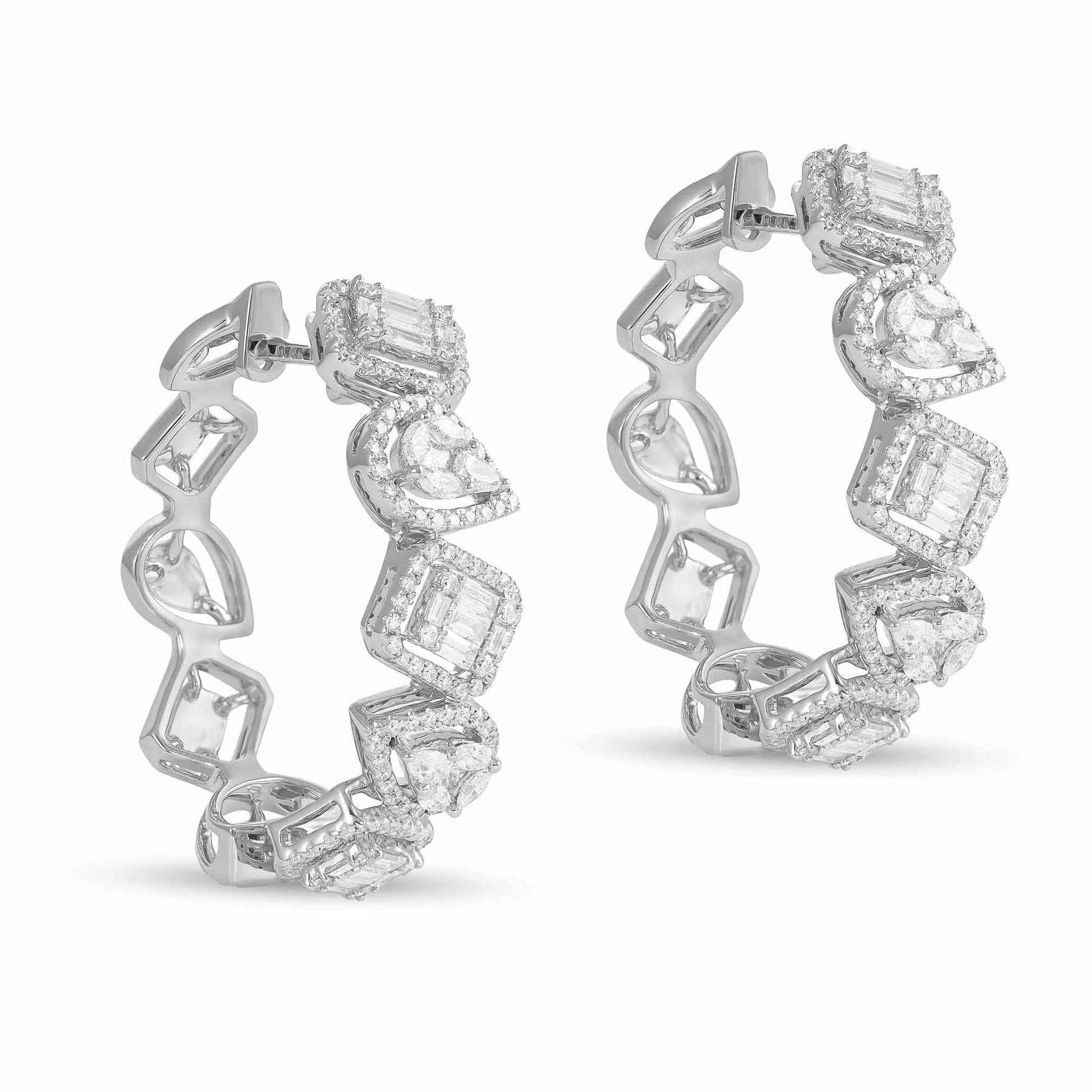 18ct White Gold And Diamond Hoop Earrings 1.8cts - angled view. Elegant nan adorned with gems of remarkable colour and brilliance. Discover affordable luxury today.